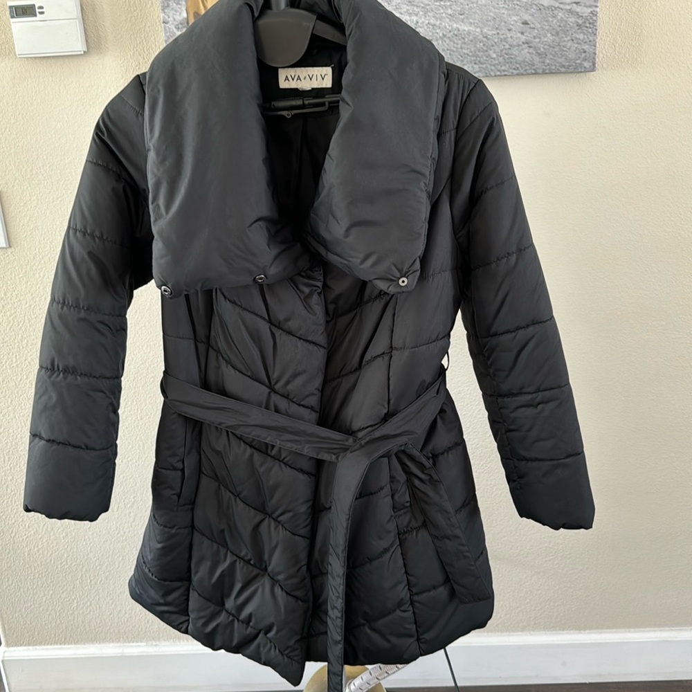 Warm jacket with zip, studs and belt